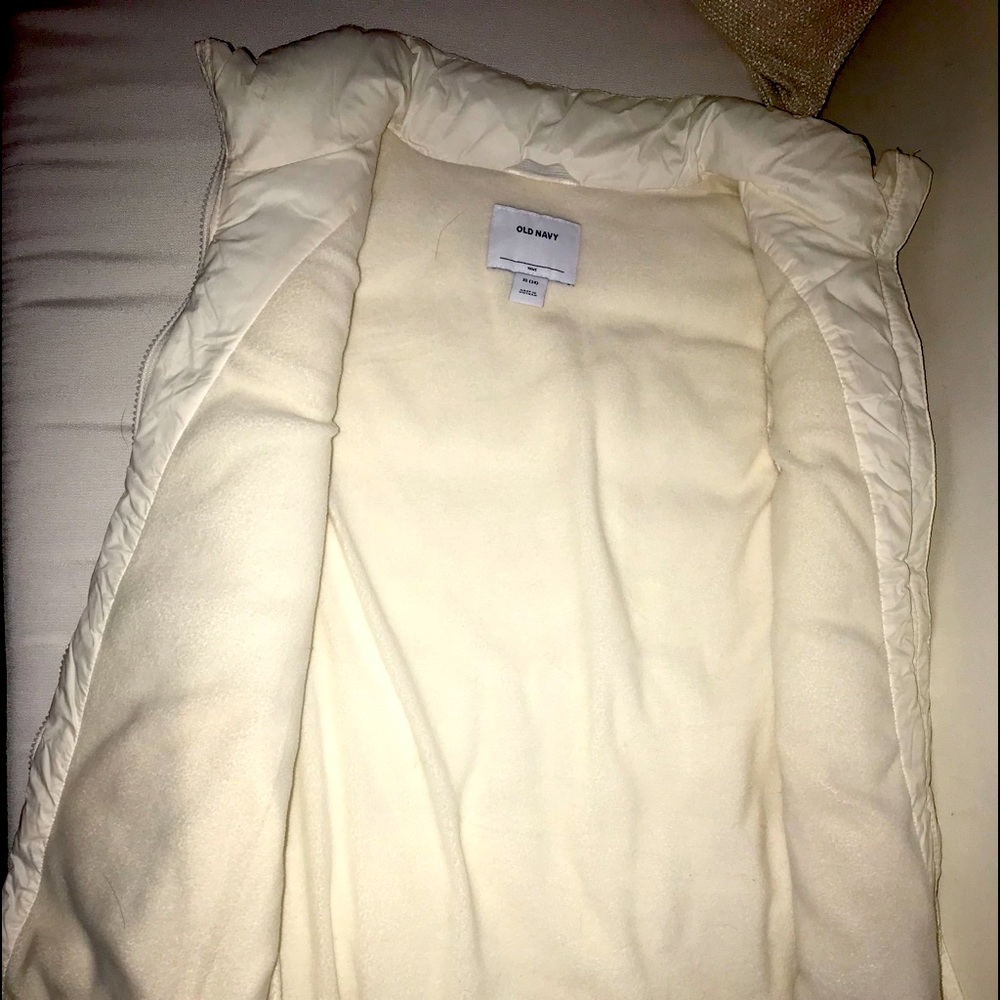White puffy vest